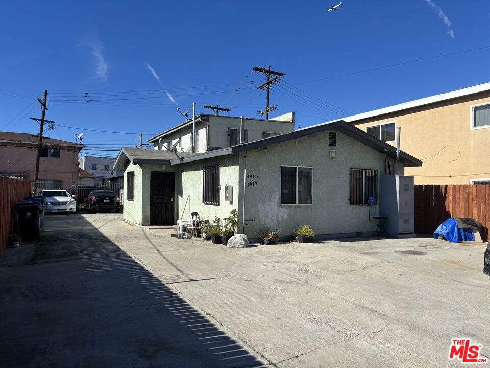 Residential Income for sale at 8915 S Normandie Avenue, Los Angeles CA featuring 2 beds and 2 baths