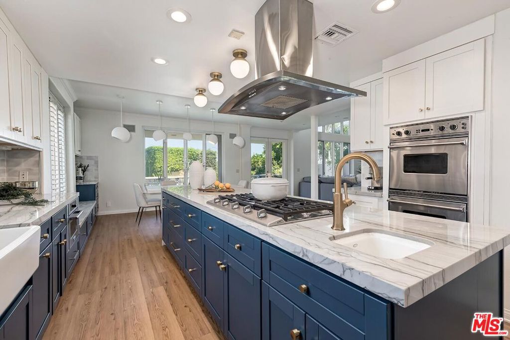Residential for sale at 12683 Promontory Road, Los Angeles CA featuring 4 beds and 5 baths