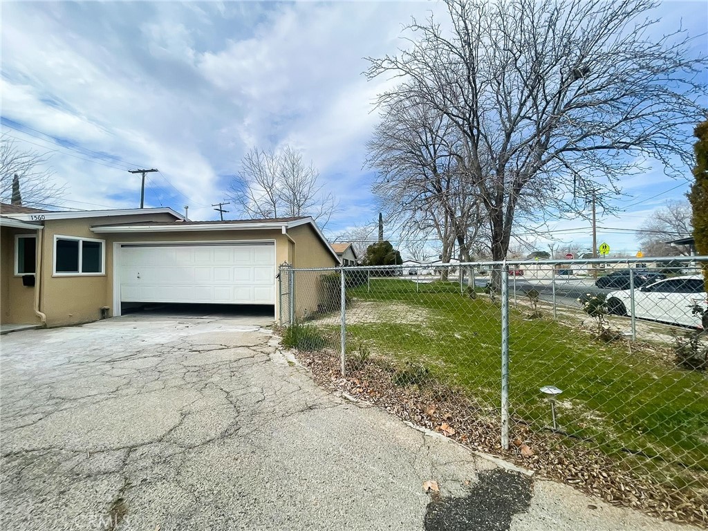 Residential for sale at 1560 W Avenue H10, Lancaster CA featuring 3 beds and 2 baths