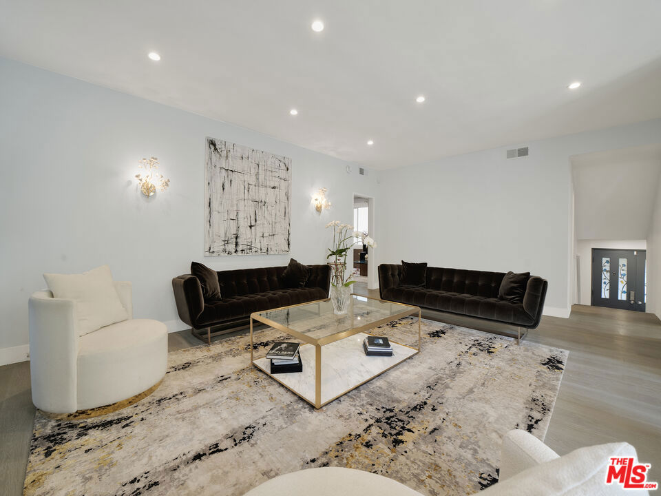 Residential for sale at 438 N Palm Drive 1, Beverly Hills CA featuring 2 beds and 3 baths