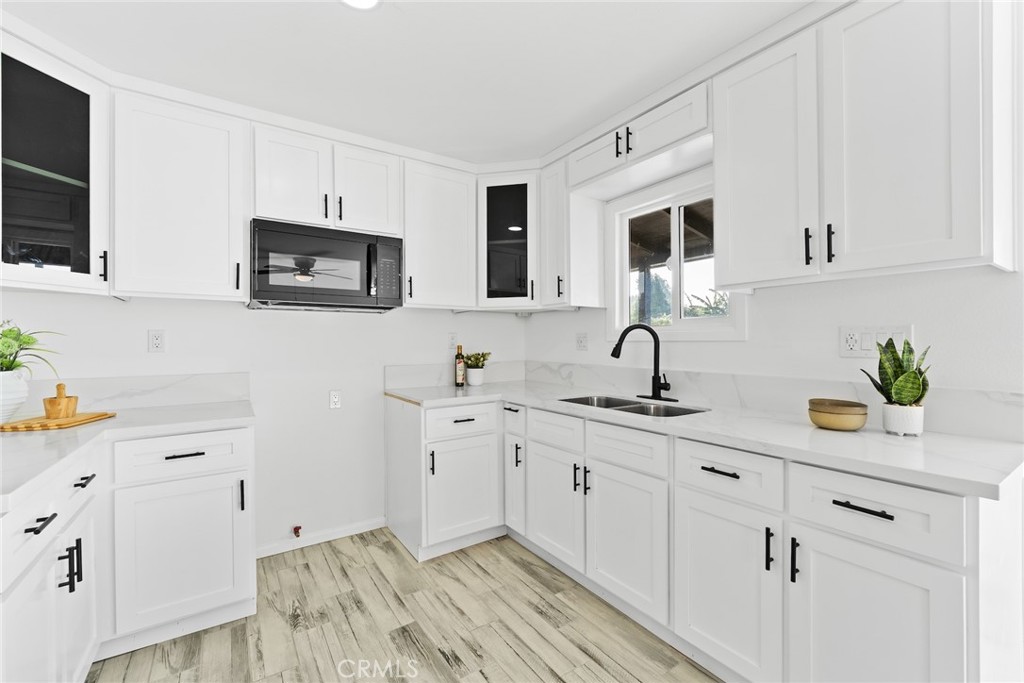 Residential for sale at 1619 W 68th, Los Angeles CA featuring 2 beds and 2 baths