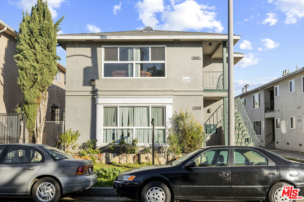 Residential Income for sale at 966 N Serrano Avenue, Los Angeles CA featuring 5 beds and 4 baths