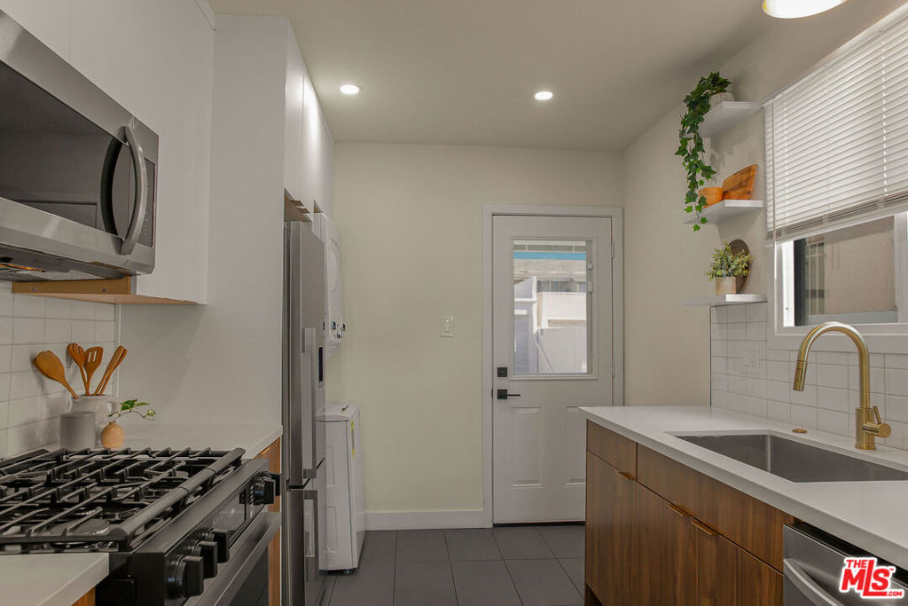 Residential Income for sale at 2048 S Burnside Avenue, Los Angeles CA featuring 8 beds and 4 baths