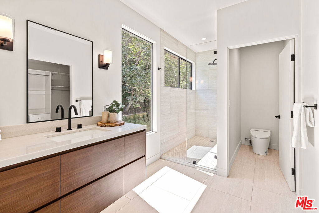 Residential for sale at 1401 N Bundy Drive, Los Angeles CA featuring 4 beds and 6 baths