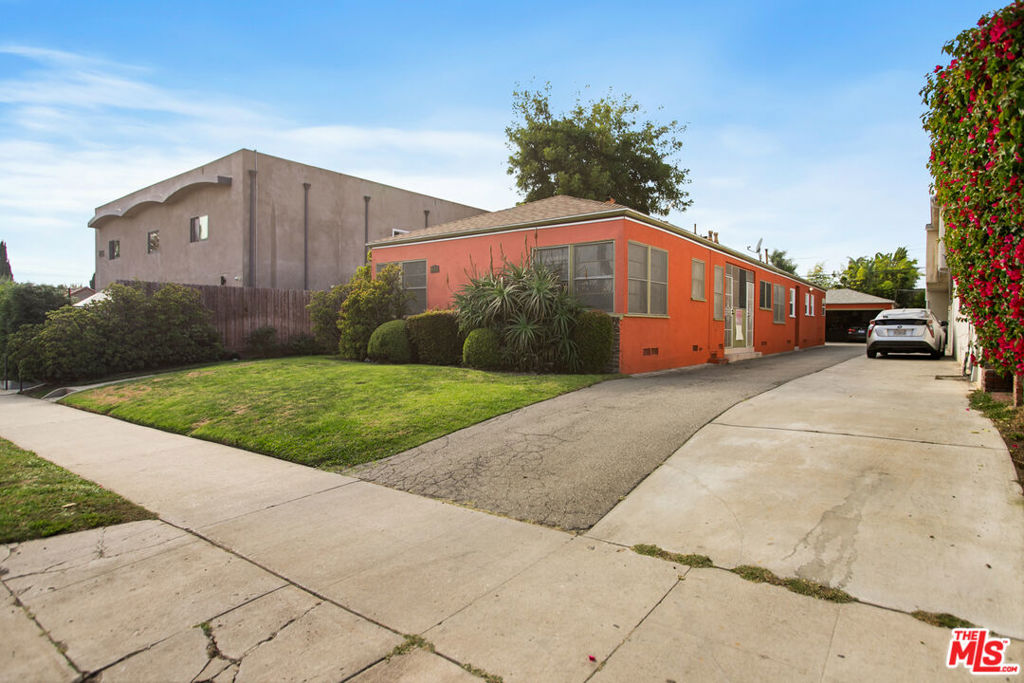 Residential Income for sale at 833 N Poinsettia Place, Los Angeles CA featuring 4 beds and 4 baths
