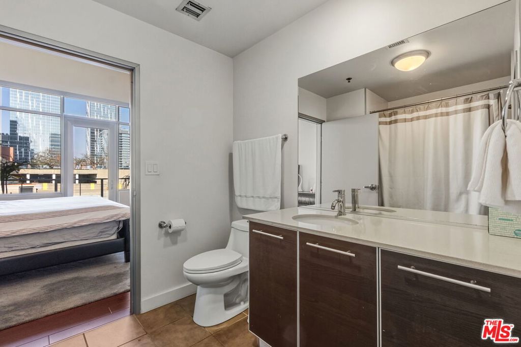 Residential for sale at 645 W 9th Street 712, Los Angeles CA featuring 2 beds and 2 baths