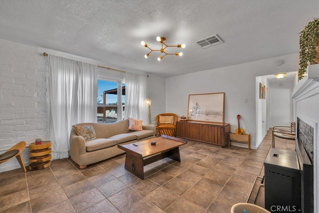 Residential for sale at 73820 Cottonwood, 29 Palms CA featuring 3 beds and 2 baths