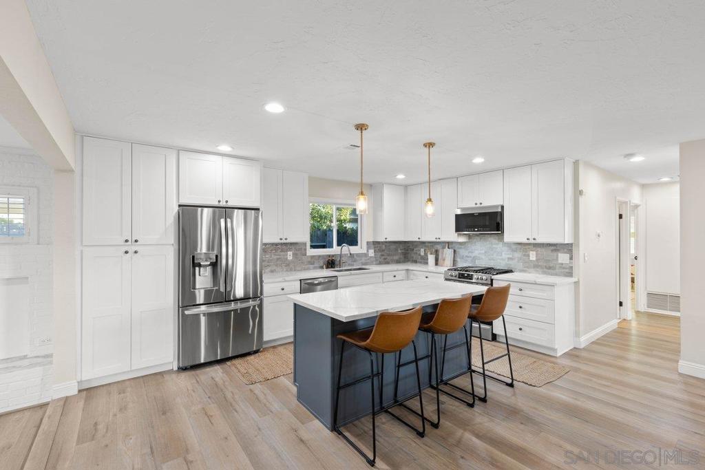 Residential for sale at 5656 Chandler Dr, San Diego CA featuring 4 beds and 3 baths