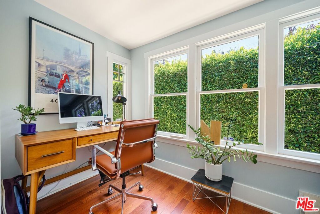 Residential for sale at 7030 De Longpre Avenue, Los Angeles CA featuring 4 beds and 4 baths