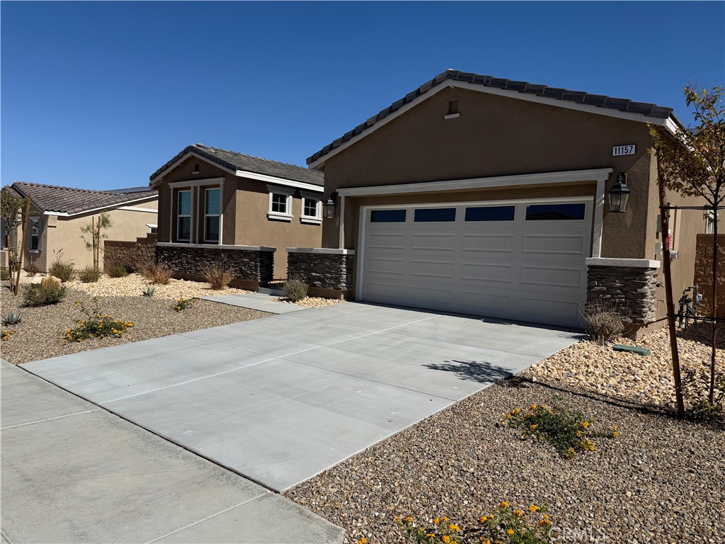 Residential Lease for rent at 11157 Canyon Cove Street, Victorville CA featuring 4 beds and 3 baths