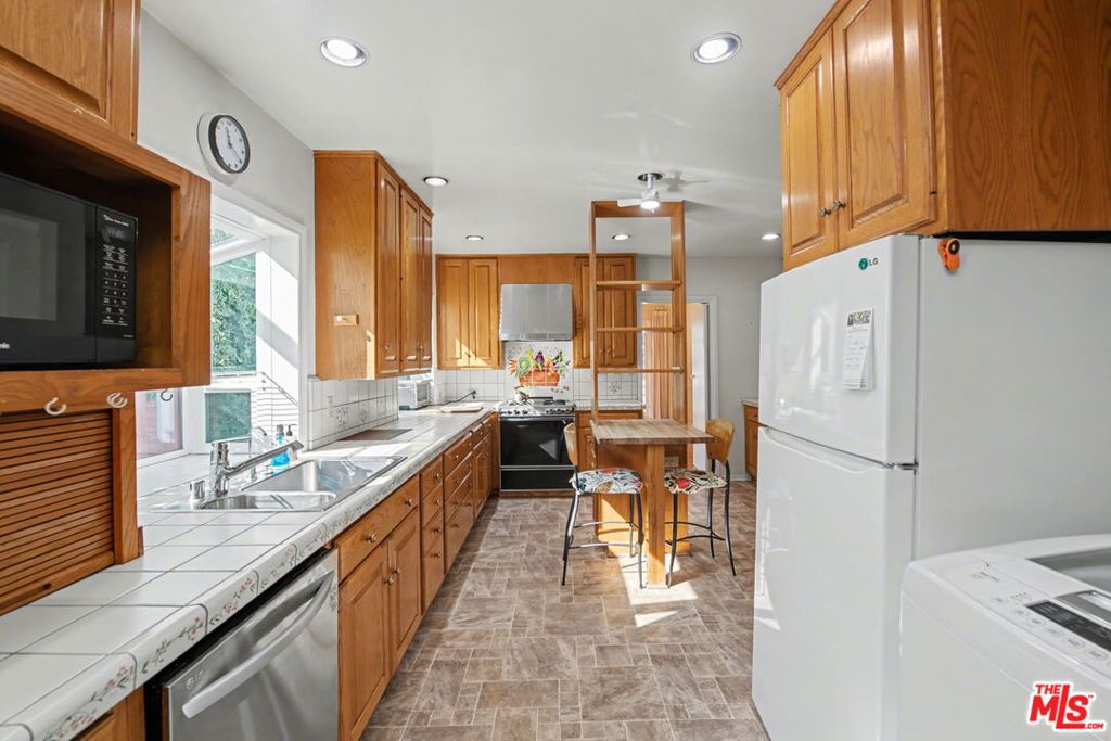 Residential for sale at 930 S Ridgeley Drive, Los Angeles CA featuring 3 beds and 2 baths