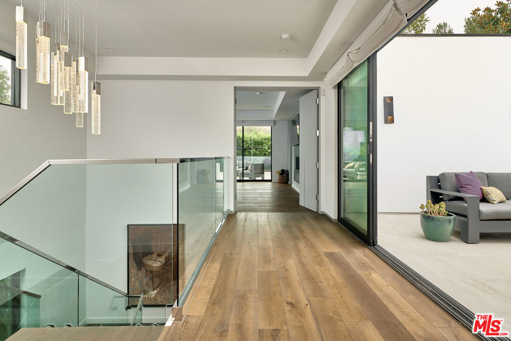Residential for sale at 144 N Bowling Green Way, Los Angeles CA featuring 6 beds and 7 baths