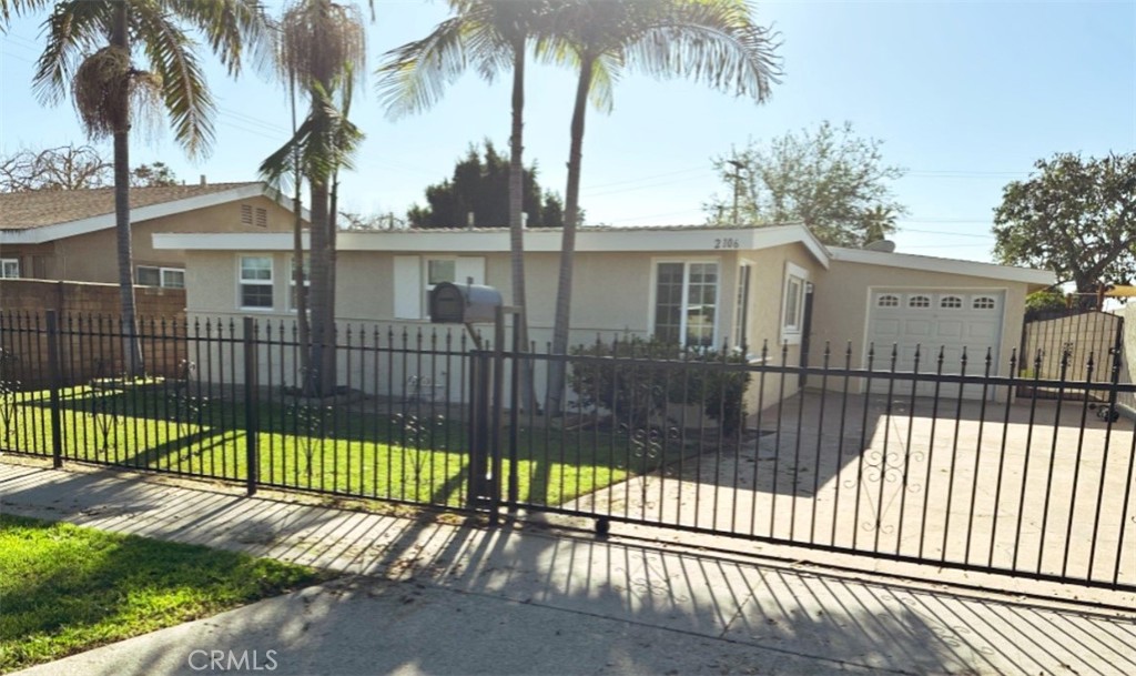 Residential for sale at 2106 W 9th Street, Santa Ana CA featuring 5 beds and 3 baths