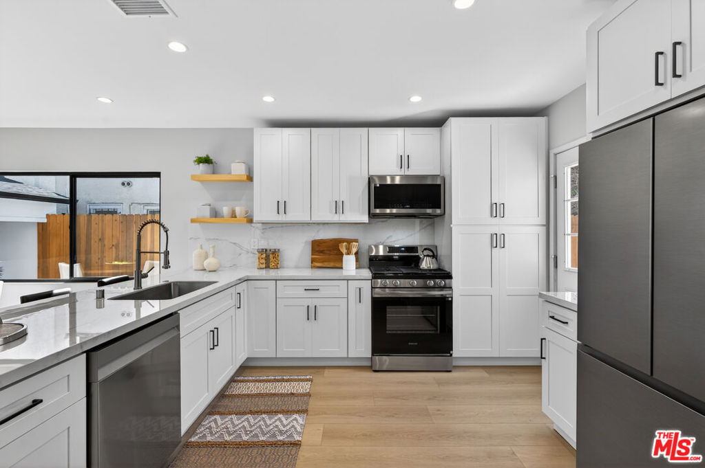 Residential for sale at 2931 S Bronson Avenue, Los Angeles CA featuring 4 beds and 3 baths