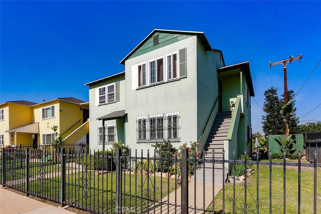 Residential Income for sale at 2115 W 102nd, Los Angeles CA