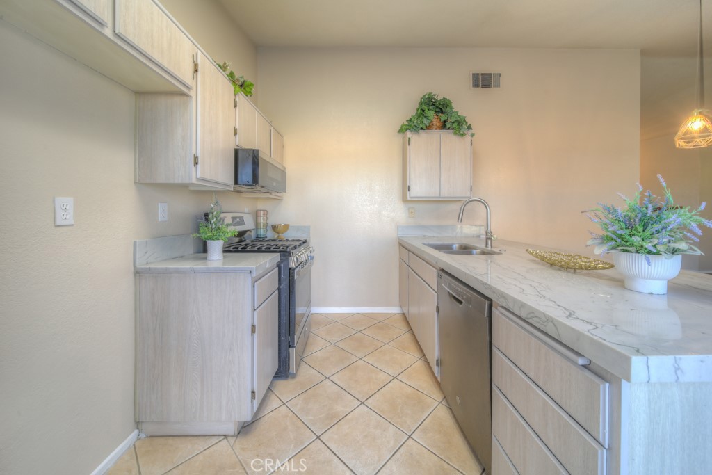 Residential for sale at 10842 Wakefield E, Adelanto CA featuring 3 beds and 2 baths