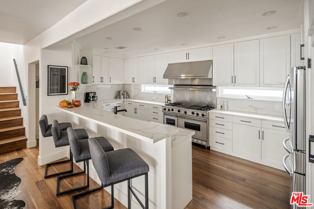 Residential for sale at 8701 Wonderland Park Avenue, Los Angeles CA featuring 5 beds and 5 baths