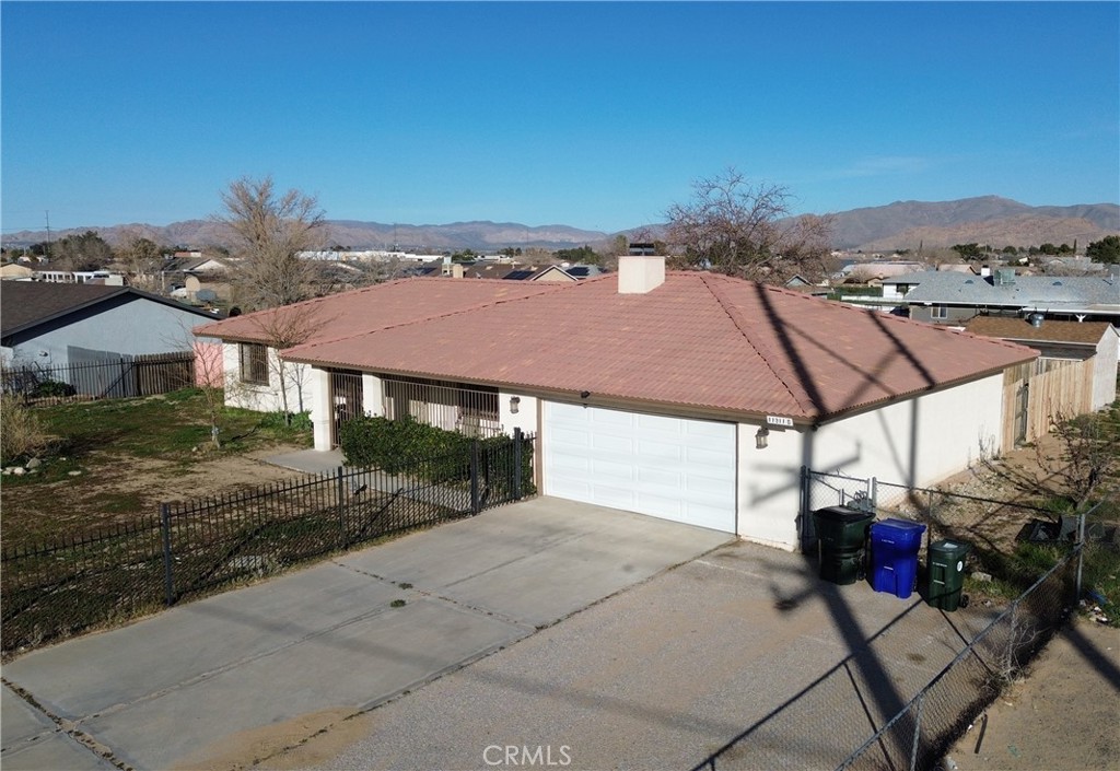 Residential for sale at 11911 Kiowa Road, Apple Valley CA featuring 5 beds and 4 baths