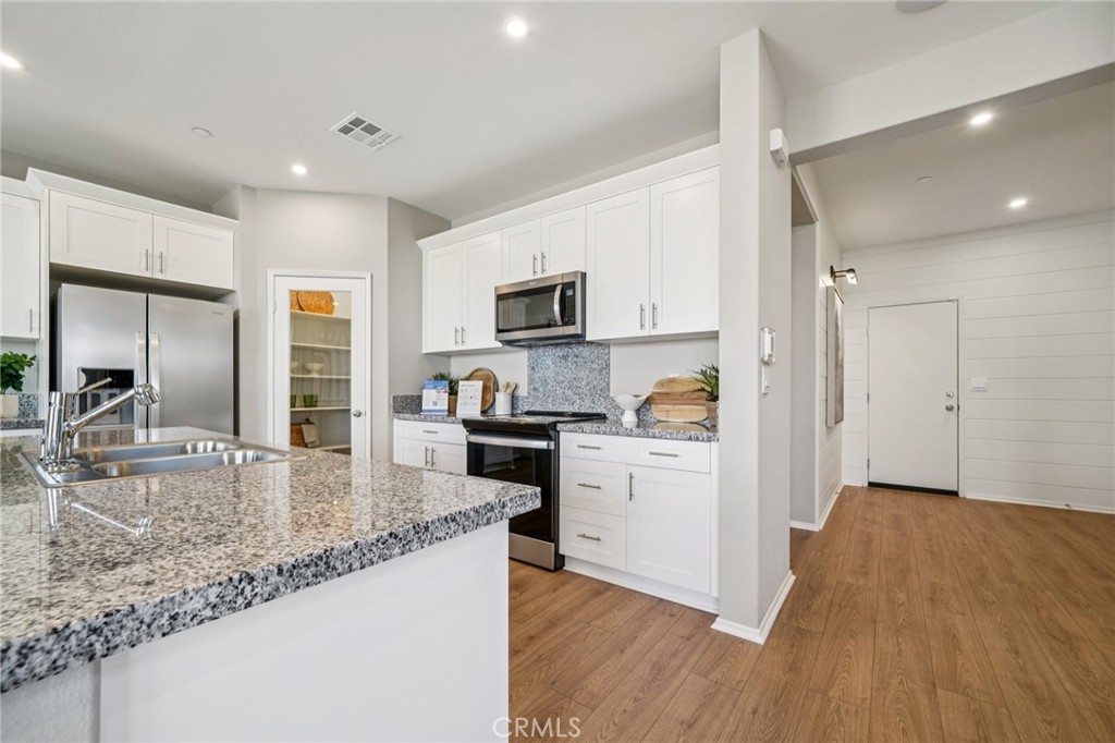 Residential for sale at 15447 Thundercloud Lane, Victorville CA featuring 5 beds and 3 baths