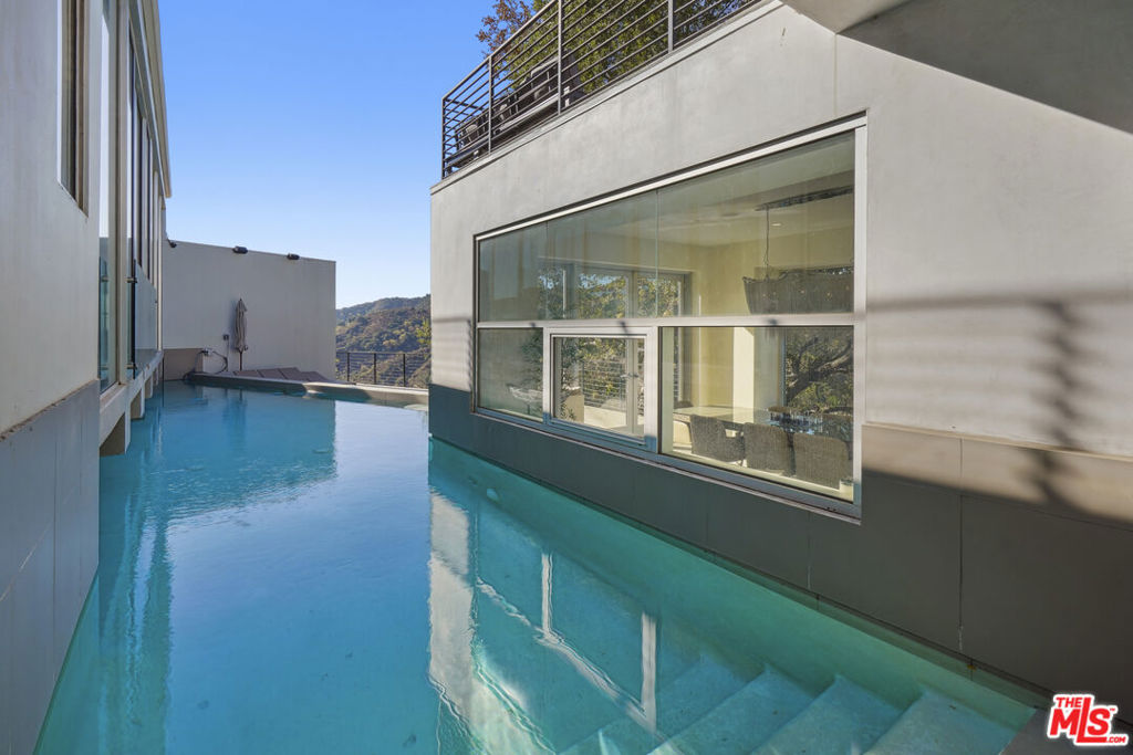 Residential for sale at 9716 Oak Pass Road, Beverly Hills CA featuring 4 beds and 5 baths