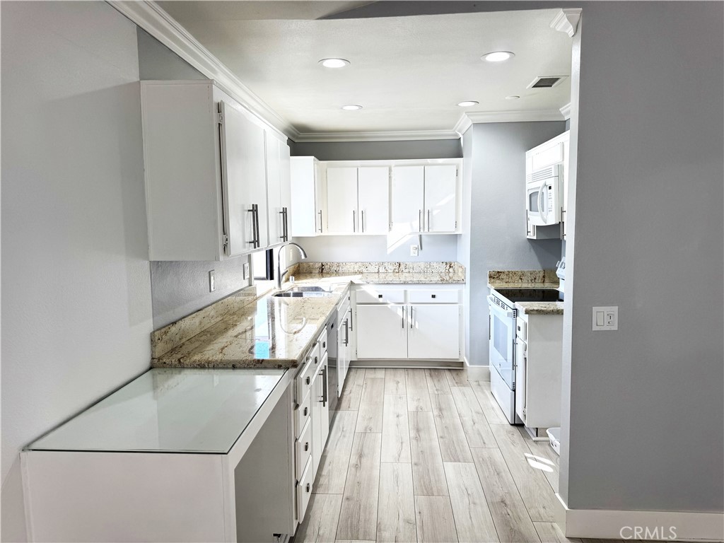 Residential Lease for rent at 7735 MOORDALE Circle, Stanton CA featuring 2 beds and 2 baths