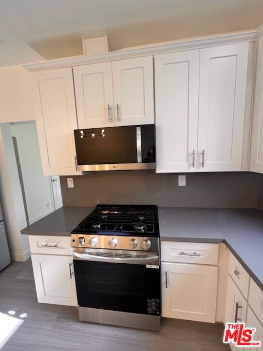 Residential Lease for rent at 841 N Kilkea Drive, Los Angeles, Los Angeles County CA featuring 2 beds and 2 baths