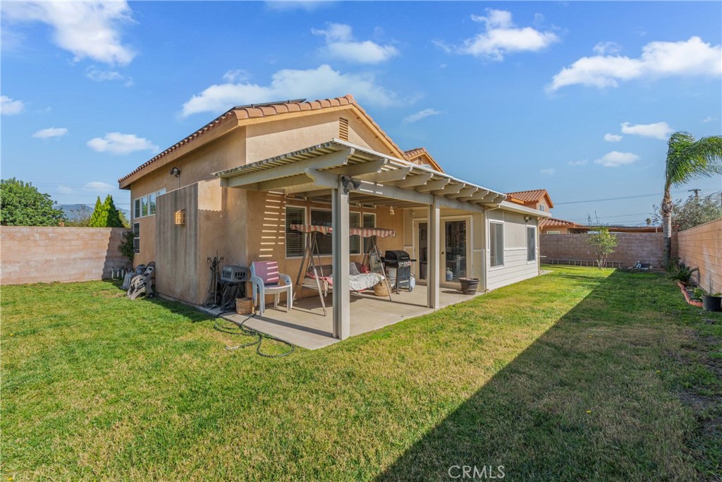 Residential for sale at 1535 W Persimmon, Rialto CA featuring 5 beds and 3 baths