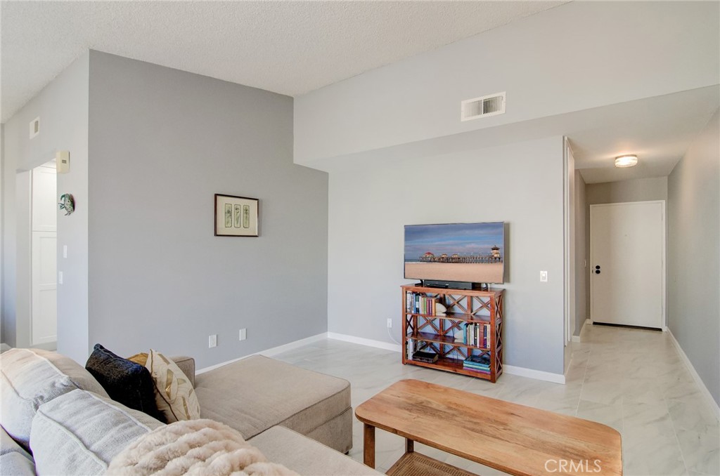 Residential for sale at 8566 Trinity Circle 815C, Huntington Beach CA featuring 1 bed and 1 bath