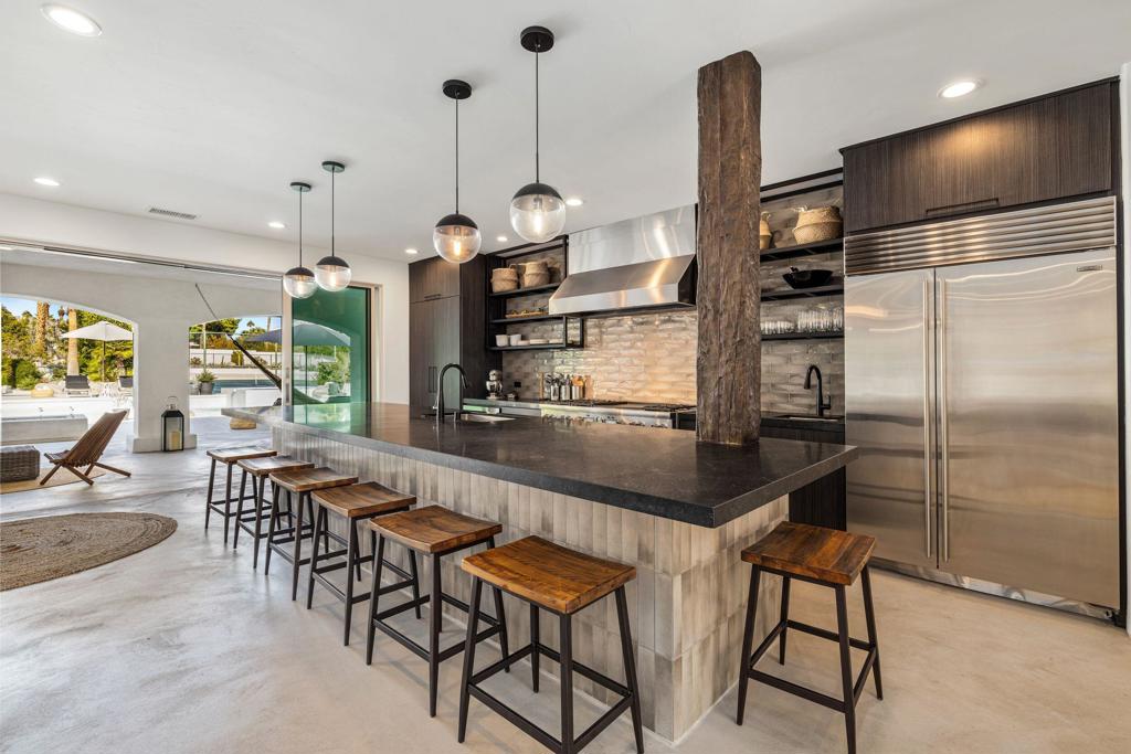 Residential for sale at 594 W Stevens Road, Palm Springs CA featuring 6 beds and 7 baths