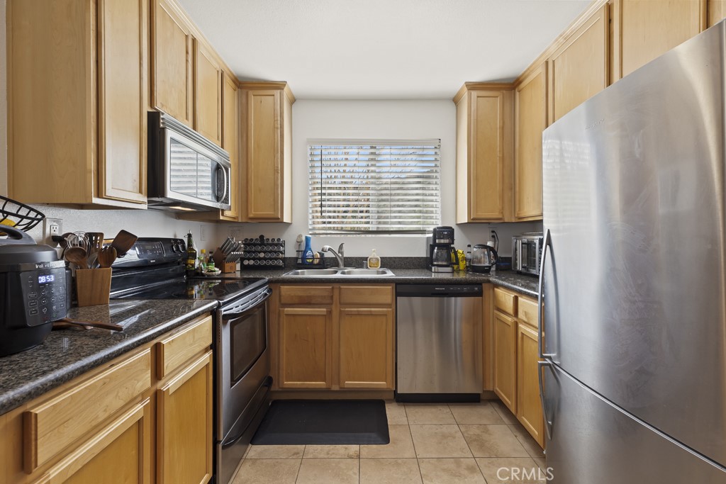 Residential for sale at 2320 Del Mar 102, Corona CA featuring 1 bed and 1 bath