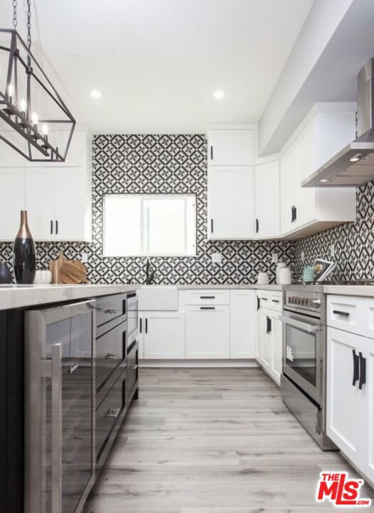 Residential for sale at 433 S Wilton Place, Los Angeles CA featuring 6 beds and 4 baths