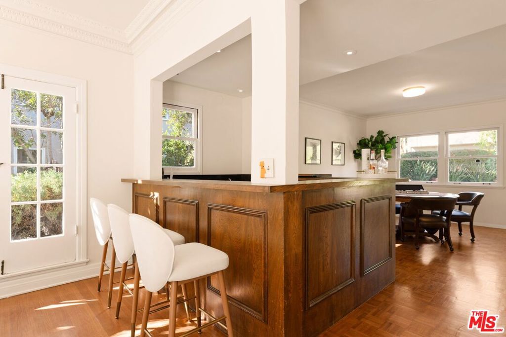 Residential for sale at 441 S Muirfield Road, Los Angeles CA featuring 7 beds and 5 baths