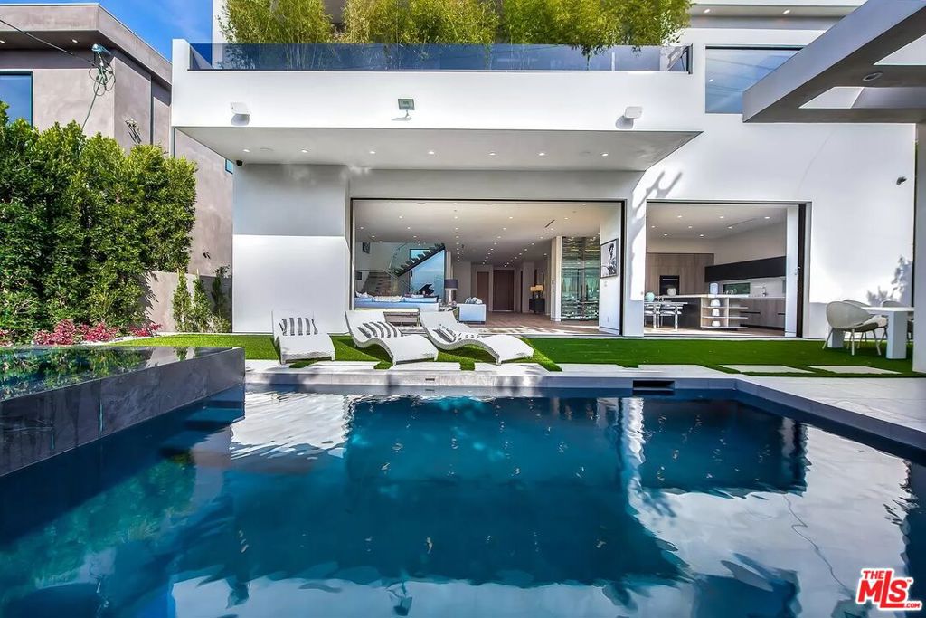 Residential Lease for rent at 723 N Orlando Avenue, West Hollywood CA featuring 4 beds and 5 baths