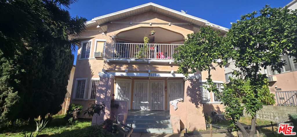 Residential Income for sale at 2223 W 14th Street, Los Angeles, CA featuring 6 beds and 4 baths