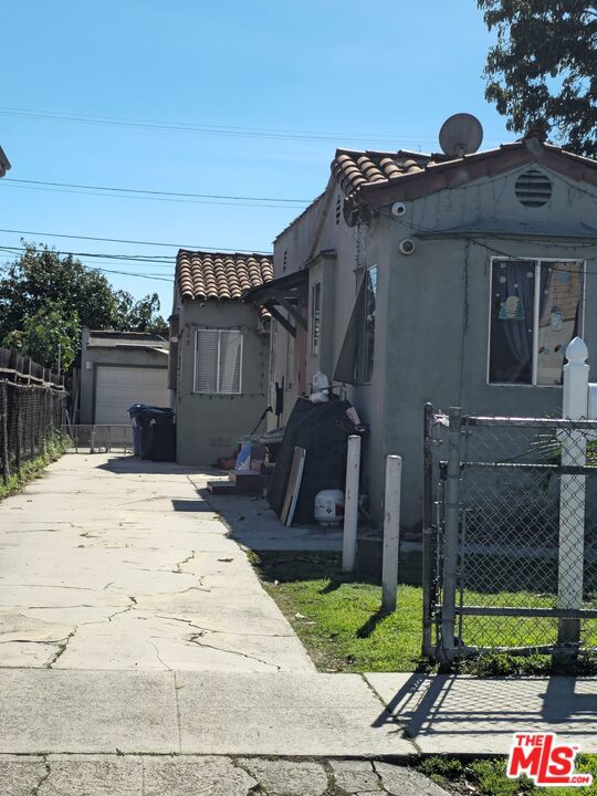 Residential Income for sale at 666 W 62nd Street, Los Angeles, CA featuring 3 beds and 2 baths