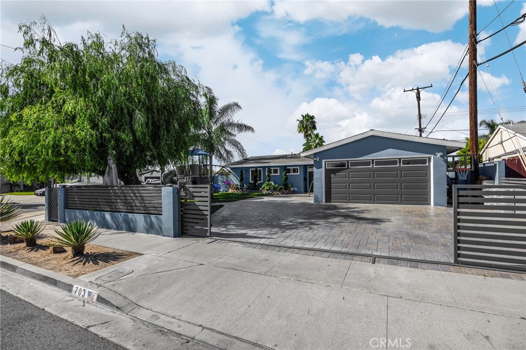 Residential for sale at 703 N Roanne, Anaheim CA featuring 4 beds and 2 baths
