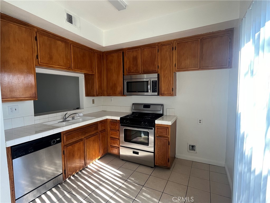 Residential for sale at 926 W Philadelphia Q93, Ontario CA featuring 2 beds and 3 baths