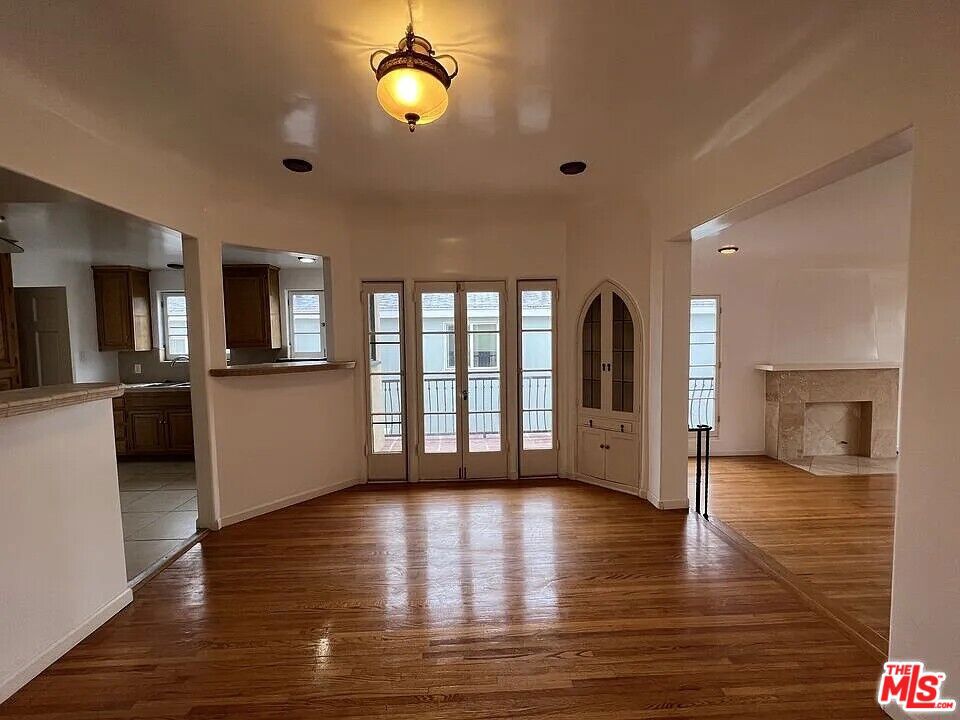 Residential Income for sale at 942 S Mansfield Avenue, Los Angeles, CA featuring 8 beds and 8 baths
