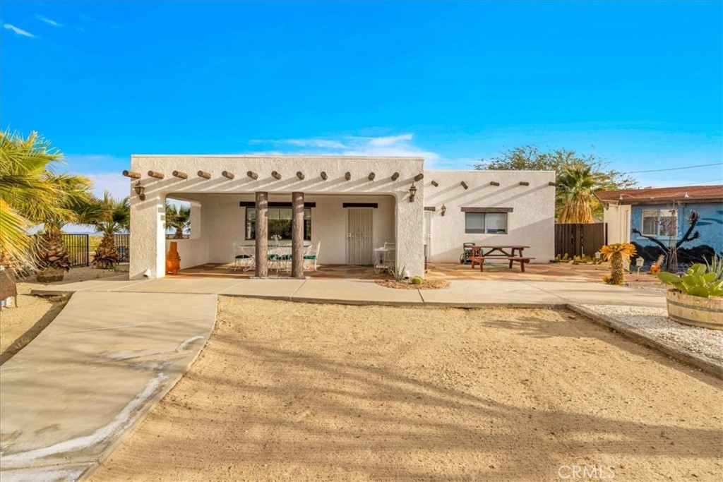 Residential for sale at 75775 Joe Davis Drive, 29 Palms CA featuring 4 beds and 3 baths