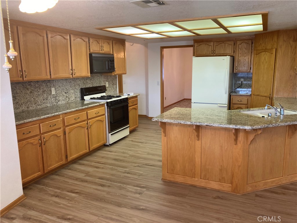 Residential for sale at 12563 Sarsi Court, Apple Valley CA featuring 4 beds and 3 baths