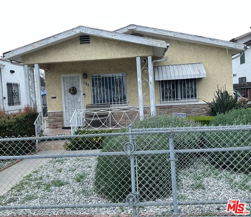 Residential for sale at 823 E 76th Place, Los Angeles CA featuring 4 beds and 2 baths