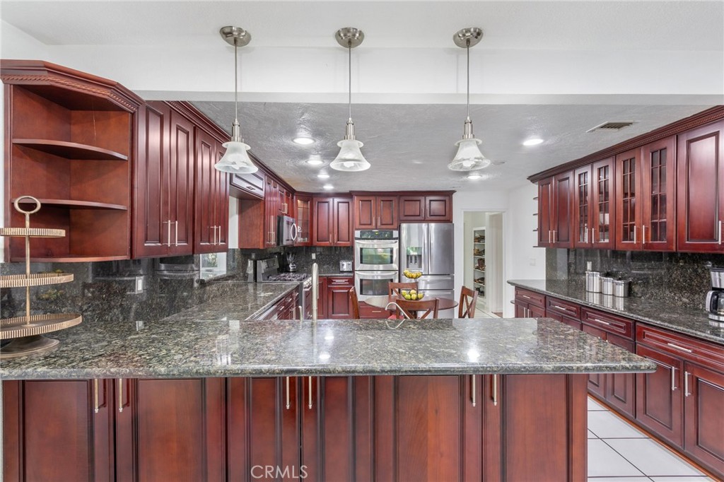 Residential for sale at 9340 Burnet Ave, North Hills CA featuring 5 beds and 3 baths