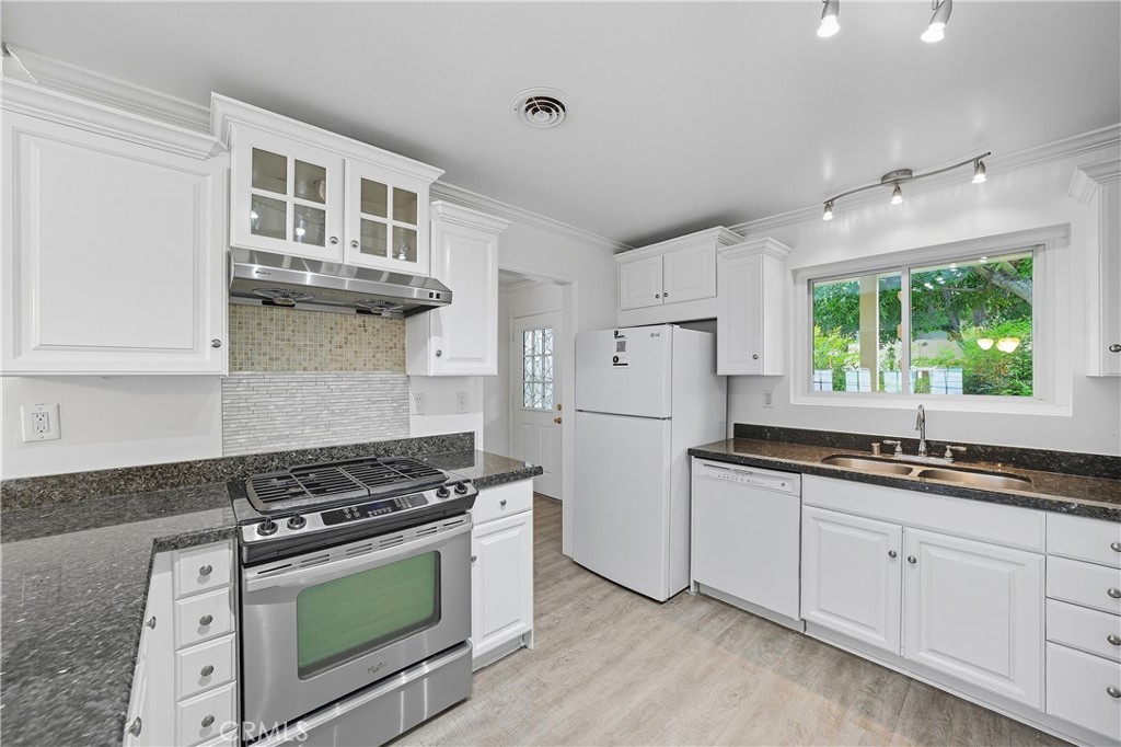 Residential for sale at 644 E Lee Place, Azusa CA featuring 4 beds and 3 baths