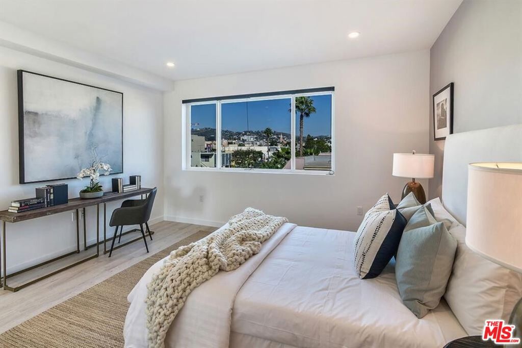 Residential Lease for rent at 1002 N Hudsoon Avenue 4, Los Angeles, Los Angeles County CA featuring 3 beds and 4 baths