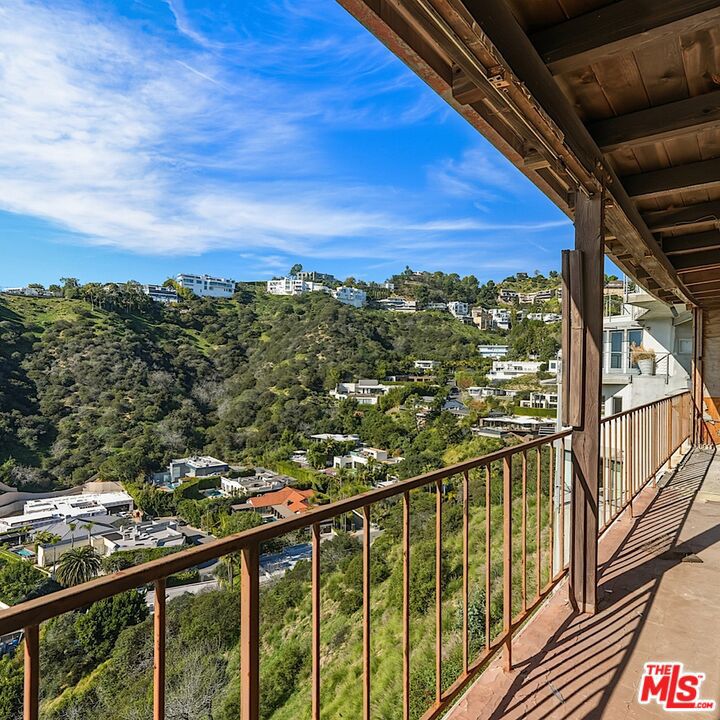 Residential for sale at 1879 N Sunset Plaza Drive, Los Angeles CA featuring 2 beds and 3 baths