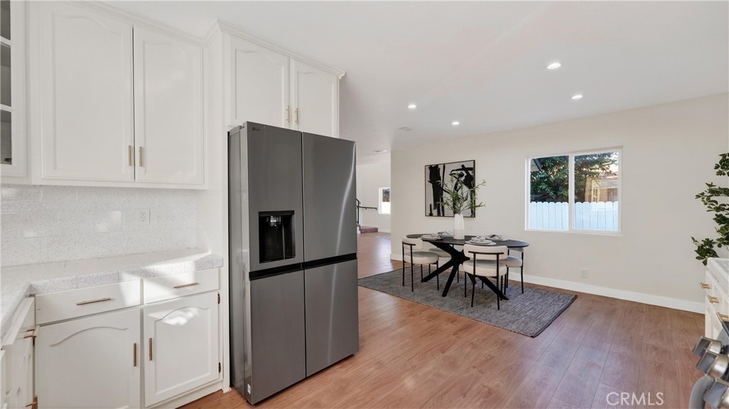 Residential for sale at 7601 Wilcox Avenue, Cudahy CA featuring 5 beds and 3 baths