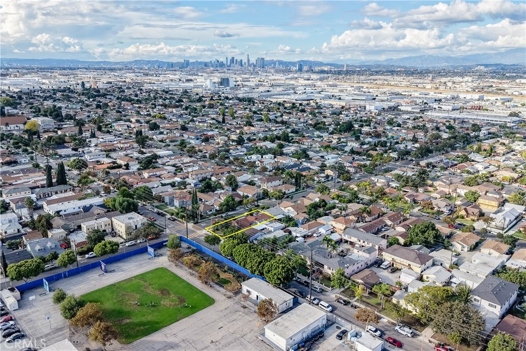 Residential for sale at 4101 E 57th St, Maywood CA featuring 5 beds and 3 baths