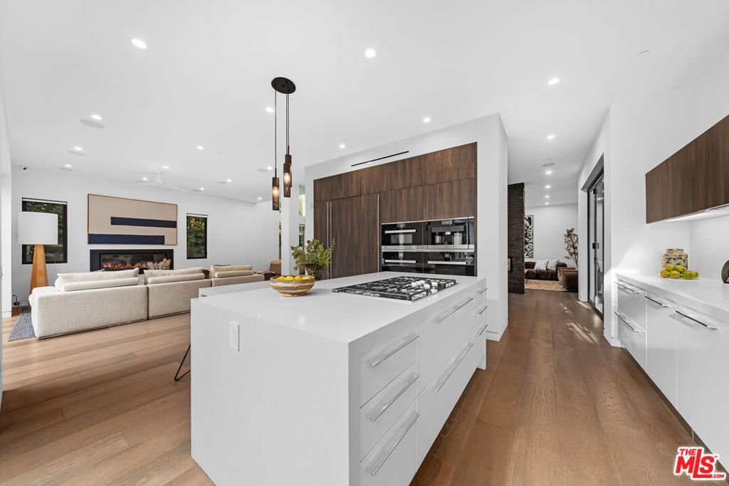 Residential for sale at 1609 N Stanley Avenue, Los Angeles CA featuring 5 beds and 6 baths