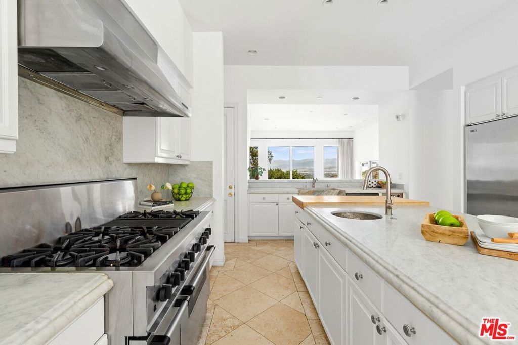 Residential for sale at 14435 Mulholland Drive, Los Angeles CA featuring 6 beds and 7 baths