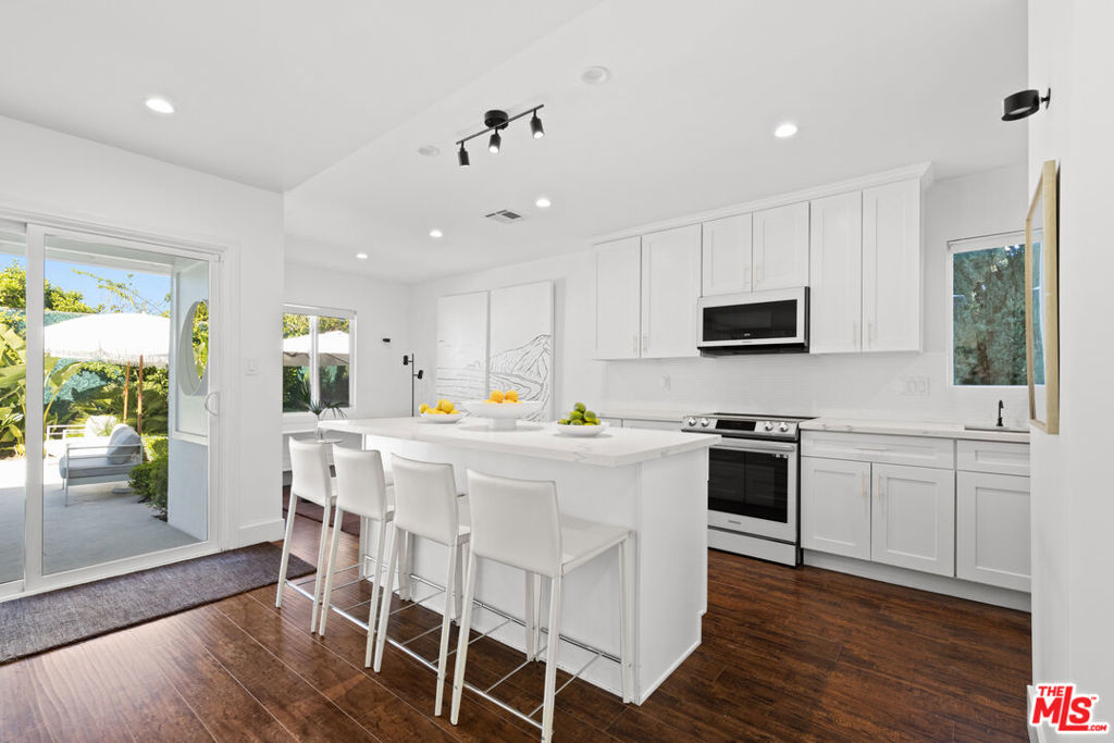 Residential for sale at 19833 Bassett Street, Winnetka CA featuring 4 beds and 2 baths